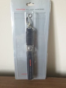 CORDÓN VODAFONE McLAREN MERCEDES CON PORTABILLETES - ¡NUEVO EMBALAJE ORIGINAL! - Imagen 1 de 11