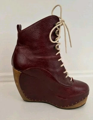 Botas de Cuero Raras Elección Irregular "LUCES INTERMITENTES" Descripción Foto 1 de 4