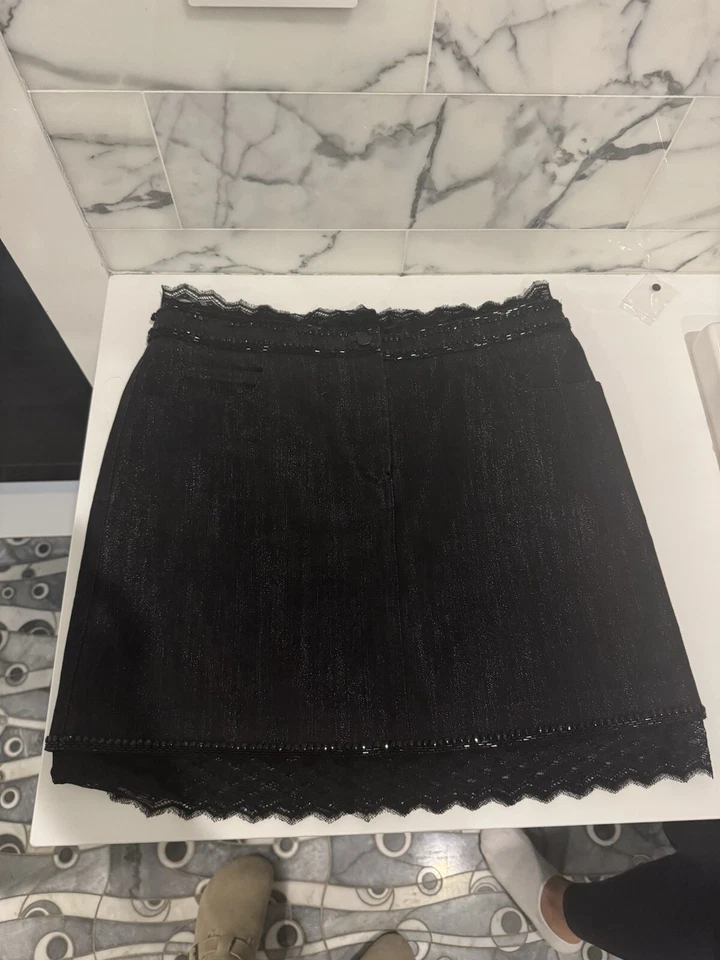 Minifalda Chanel denim con cordones Foto 1 de 3