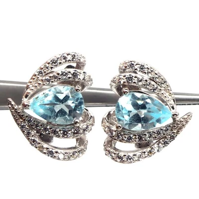925 Sterling Silver 6 x 9 MM. Sky Blue Topaz & White Zircon Birthstone Earrings - Image 1 of 4