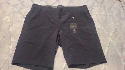 Pantalón Corto Híbrido Kenneth Cole Para Hombre 34 Negro Conciencia KCA Playa a Bar Rendimiento Foto 1 de 2