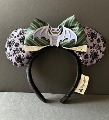 Papel pintado púrpura murciélago diadema orejas Mickey Minnie mansión embrujada de los parques de Disney Foto 1 de 4