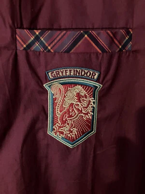 Mundo Mágico Harry Potter Gryffindor Casa Cosida con Botones en Bolsillo L Foto 1 de 4