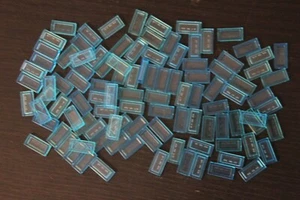 100x New Trans-Light Blue Genuine LEGO Tiles 1 x 2 - Smooth Water Transparent - Picture 1 of 3