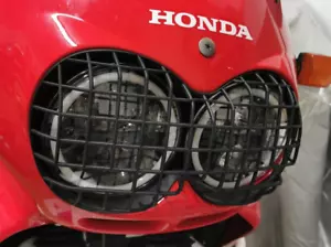 Griglia fari per Honda XRV 750 Africa Twin RD07a Headlamp grill guard (1996-2003 - Imagen 1 de 13