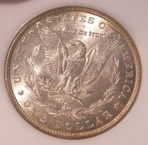 1885 Morgan Silver Dollar - UNC, Cartwheel Luster, Gold peripheral toning 2343 - Picture 1 of 2