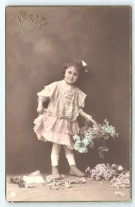Postcard RPPC Souvenir Pretty Little French Girl Basket of Blue Flowers c1914 - Picture 1 of 3