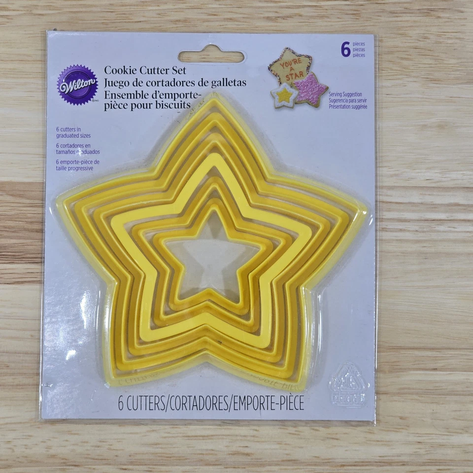 Cortadores de galletas Wilton 6 piezas de plástico amarillo tamaño graduado estrella de anidación Foto 1 de 4