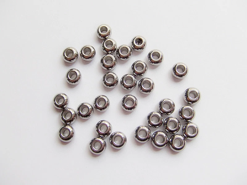 15pz perline distanziali in acciaio inox  tondo 5x3mm colore argento scuro  - Immagine 1 di 1