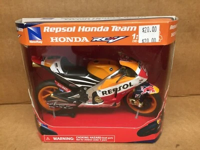 NEW RAY MFG.  RACING MOTOR CYCLE 1:12 SCALE REPSOL HONDA TEAM MARC MARQUEZ - Image 1 of 4