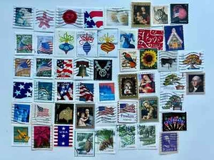 50 US Postage Stamps ON PAPER - Most are Forever - all canceled - Picture 1 of 5