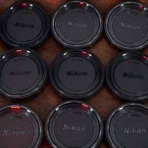 Nikon Genuine Body Cap Cover for DF F3 F2 D610 D750 D810 D3300 D5600 D850 D5 D4 - Picture 1 of 7