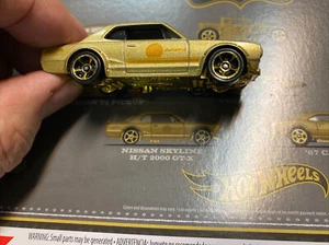 NISSAN SKYLINE GT-X H/T 2000 Nuevo ORO SUELTO 2022 Hot Wheels TARGET FAO Negro - Imagen 1 de 9