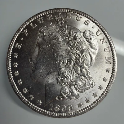 1899 O MORGAN SILVER DOLLAR! BEAUTIFUL UNCIRCULATED COIN! Heavy Bag Marks - Image 1 of 4