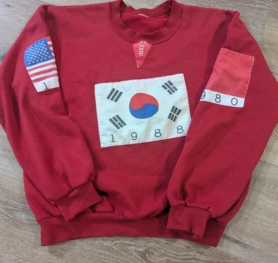 Sudadera Vintage 1988 Bandera de las Naciones Juegos Olímpicos XXIV Cuello Redondo Talla Grande Foto 1 de 4