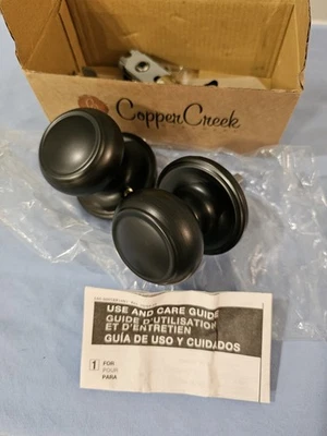 Perillas de puerta Copper Creek Colonial negras 2 cajas 4 perillas en total (CK2020TB)  Foto 1 de 4