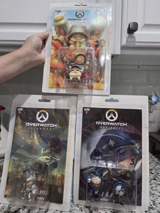 Menge 3 Overwatch Comics & Rucksack Aufhänger Clips TORBJORN, ANA AMARI, ETC. - Bild 1 von 12