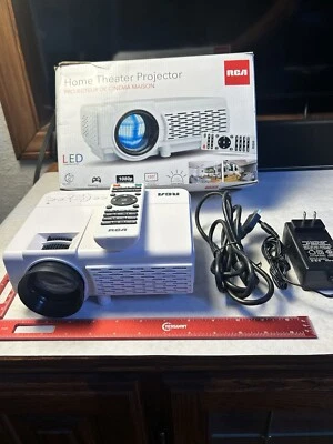 RCA Home Theater Porjector RPJ116-Plus with remote, power cord & HDMI cord - Image 1 of 4