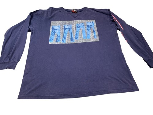 Navy long sleeve Tommy Hilfiger jeans shirt with white and red vertically repeated “TO” and “Y2K” text, 2XL size.