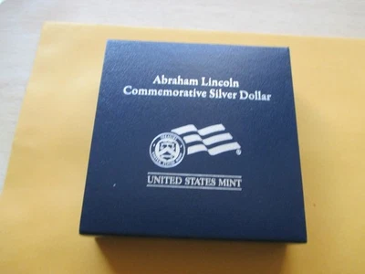 UNITED STATES MINT 2009 ABRAHAM LINCOLN COMMENORTIVE SILVER DOLLAR - Image 1 of 4