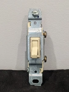 Eaton - 1301-7V - Ivory Quiet Toggle Wall Light Switch Single Pole 15A 120V - Picture 1 of 3