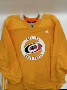 New Adidas Carolina Hurricanes Practice Yellow Jersey Size 58+ - Picture 1 of 3