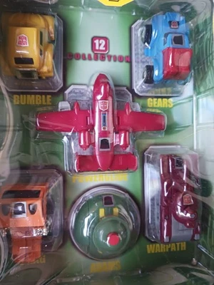 FIGURA TRANSFORMERS COLLECTION 12 MINIBOT COSMOS POWERGLIDE BUMBLEBEE ENGRANAJES ARRASTRE Foto 1 de 4