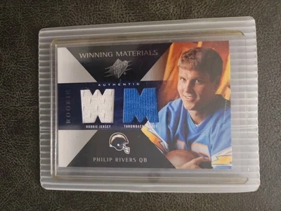 2004 UPPER DECK SPX WINNING MATERIALS PHILIP RIVERS DUEL RELIC RC CHARGERS  - Image 1 of 2