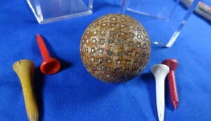 VINTAGE ANTIQUE MESH GOLF BALL 4 VINTAGE GOLF TEES, DISPLAY OF GOLF HISTORY - Picture 1 of 9