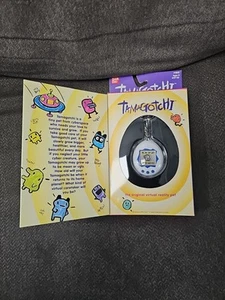 BANDAI TAMAGOTCHI 1996-1997 version #1800 white with blue new sealed box - Picture 1 of 5