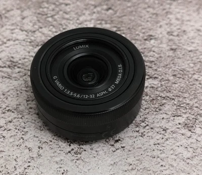 Panasonic H-FS12032 12-32mm F3.5-F5.6 Lens BROKEN - Image 1 of 4