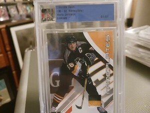 2002 ITG MARIO LEMIEUX  GAME USED  SEAMS 01/01 RUBY 