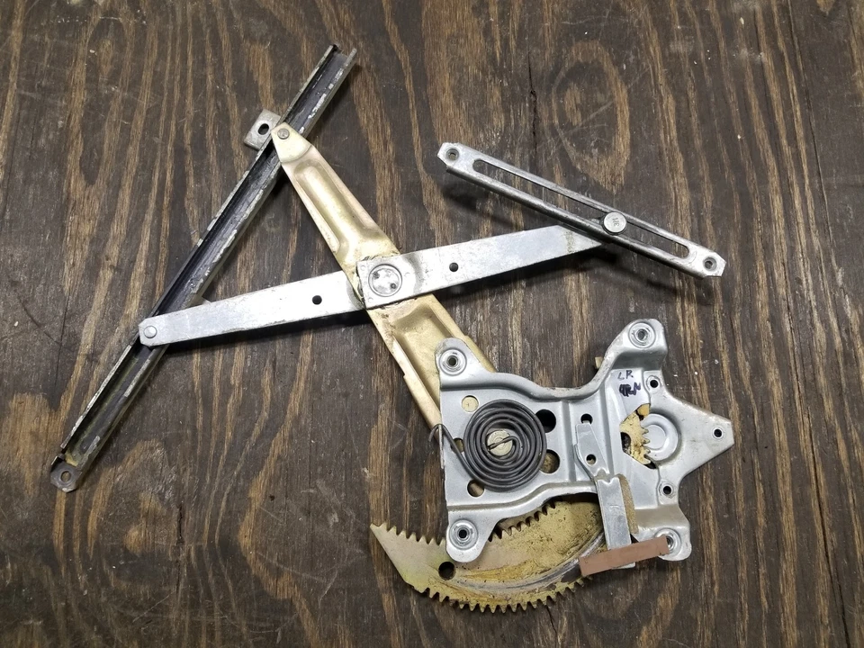 REGULADOR DE VENTANA ELÉCTRICA LR SIN MOTOR 90-95 TOYOTA 4RUNNER OEM CONDUCTOR TRASERO Foto 1 de 1