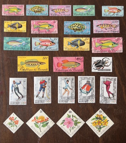 BURUNDI LOT OF 25 DIFFERENT USED STAMPS FISH, WINTER OLYMPICS, FLOWERS Cover