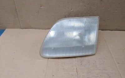 Faro izquierdo Ford F150 2000 nublado Foto 1 de 4