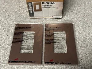 2 NEW Cooper PJS26BB-SP-L One Gang Decorator Screwless Wallplates Brushed Bronze - Picture 1 of 3