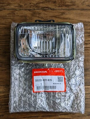 Подлинный оригинальный производитель Honda блок объектива фары в сборе XR400R XR650R 33123-KCY-670 - Изображение 1 из 2