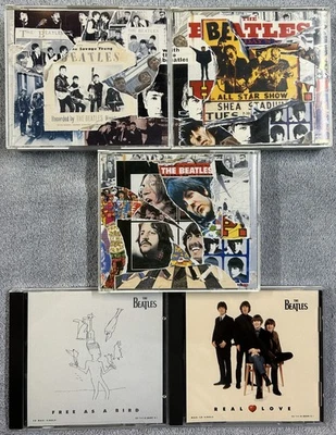 The Beatles Anthology 1, 2, and 3 CDs + Free As A Bird & Real Love CD singles. - Image 1 of 4