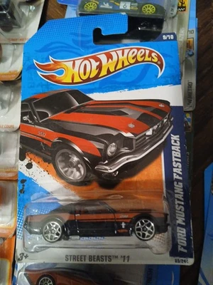 2011 Hot Wheels Street Beasts FORD MUSTANG FASTBACK Red w/black - Image 1 of 2
