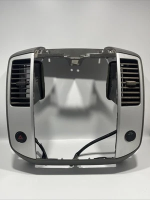 Nissan Frontier 2009-2012 tablero central bisel ventilaciones código con color acero OEM usado Foto 1 de 4