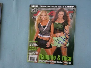 TRISH STRATUS and LITA Autographed Wrestling Magazine December 2004 FREE Ship - Picture 1 of 1