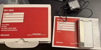 Teléfono plegable japonés nostálgico Docomo SH-06A blanco  Foto 1 de 4