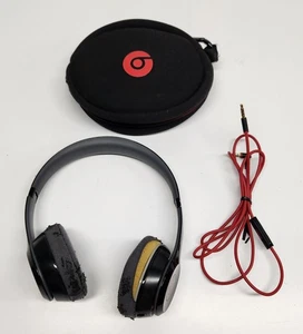 Auriculares inalámbricos sobre la oreja Beats by Dr. Dre Solo2 negros - Almohadillas usadas probadas - Imagen 1 de 13