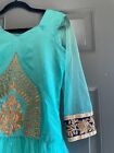 Turquoise anarkali suit with net sleeves and matching leggings 