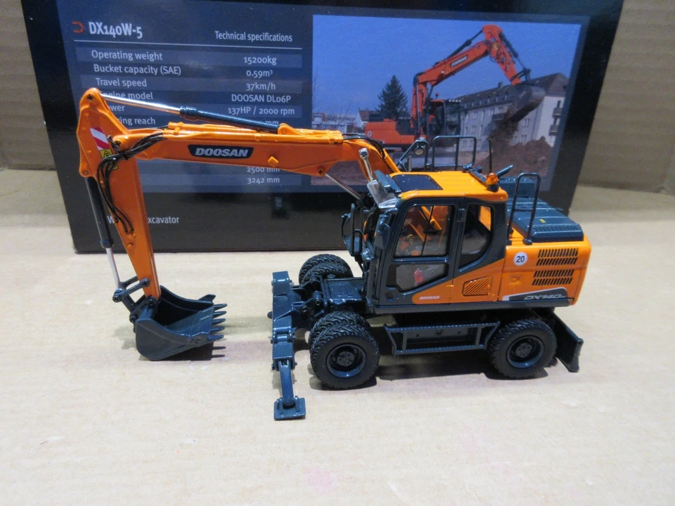 Universal Hobbies UH Doosan DX140W Excavator model rubber duck excavator. - Image 1 of 4