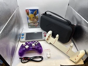 Paquete de consola Nintendo Switch Lite edición Zacian y Zamazenta Lets Go Eevee - Imagen 1 de 20