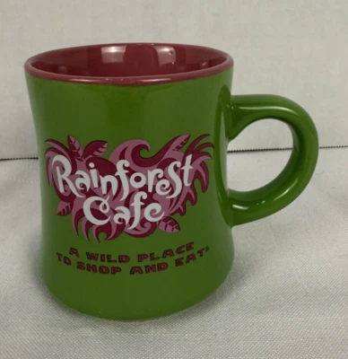 Taza de té de café Rainforest Café verde y rosa, un lugar salvaje para comprar y comer Foto 1 de 4
