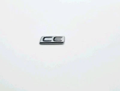 2003-2013 TOYOTA COROLLA CE REAR LETTERS CHROME LOGO LID EMBLEM BADGE OEM  - Image 1 of 3