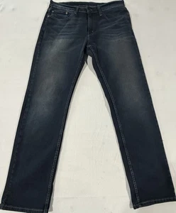 Pantalones de mezclilla Levi’s 559 para hombre 33x34 azul pierna recta elásticos azul lavado oscuro usados en excelente estado - Imagen 1 de 9