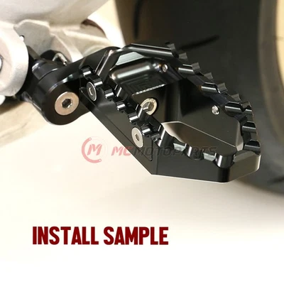 Clavijas de pie de crucero delanteras de extensión negras de 1 pulgada para VMAX 1200 85-01 02 03 04 05 06 07 Foto 1 de 4